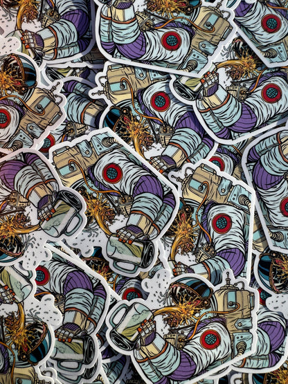 stickers of a spaceman drinking beer